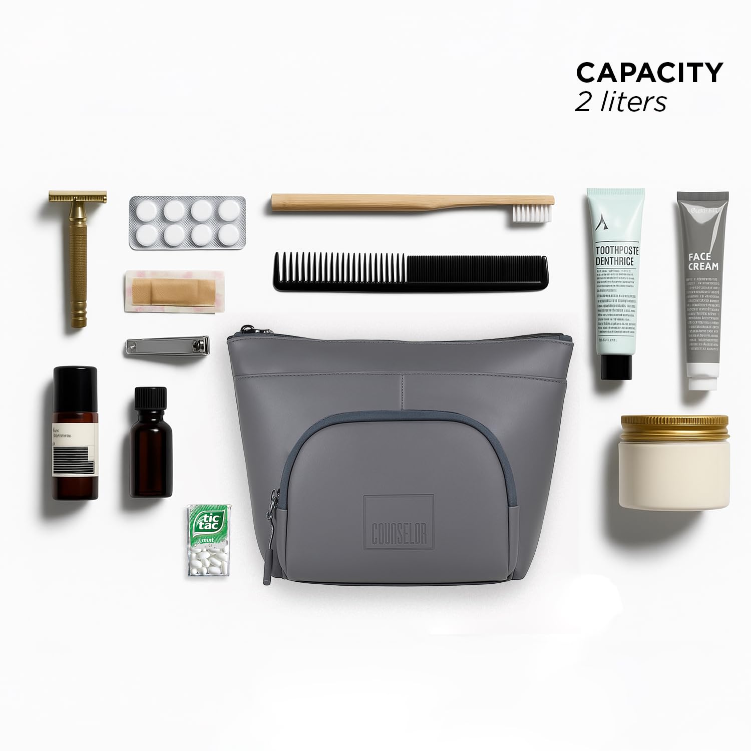 Grey Eiko pouch with toiletries and grooming essentials, showcasing minimalist design and compact storage.