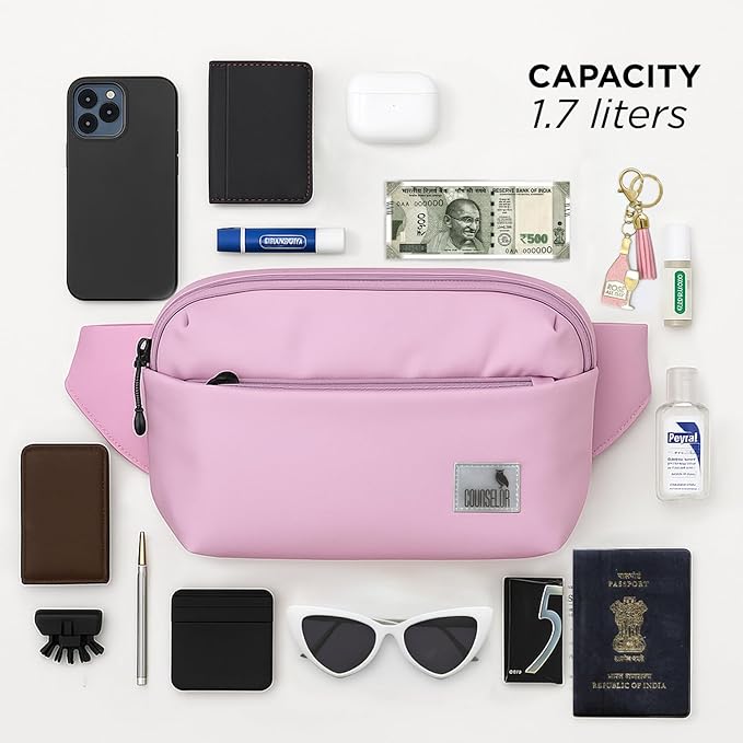 The Avelin pink waistpack showcasing its 1.7-liter capacity with essential items including a phone, wallet, and keys.