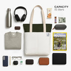 Skylin tote bag in offwhite and army green with everyday items showing spacious 15 liters capacity.