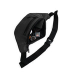 Stylish black waist bag made from vegan leather, ideal for daily use, showcasing its interior and organization features.