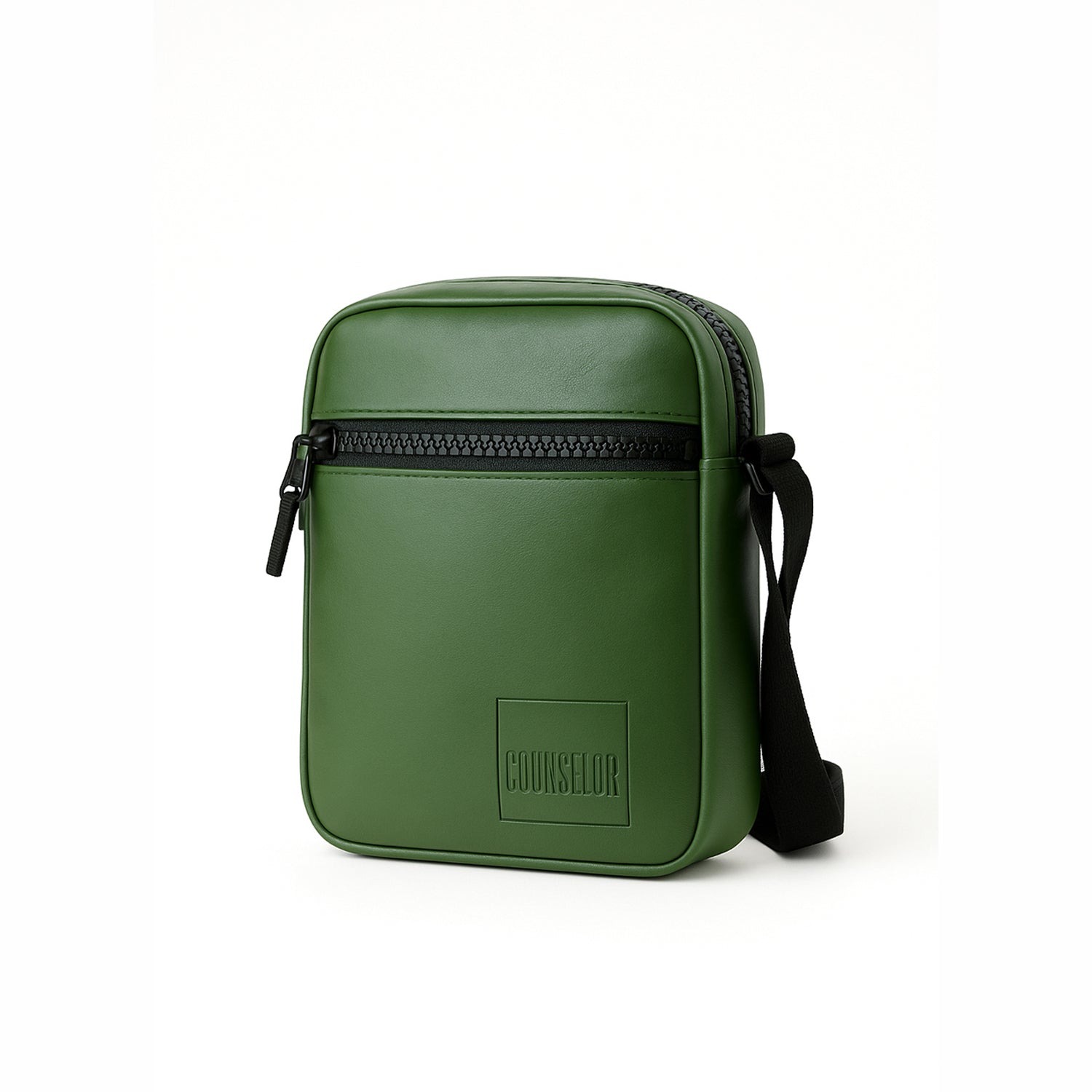The Bloc green bag, stylish vegan leather design with a zipper and adjustable strap, perfect for daily use and travel.