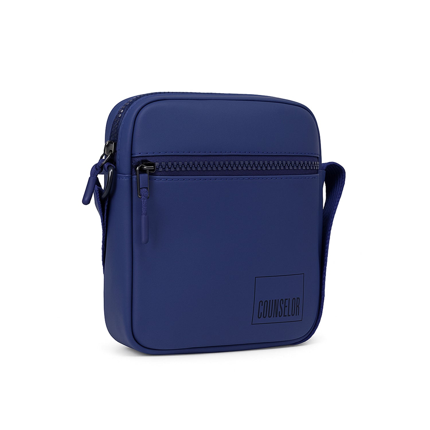 Stylish navy blue vegan leather crossbody bag with adjustable strap and zipper pockets for organization.