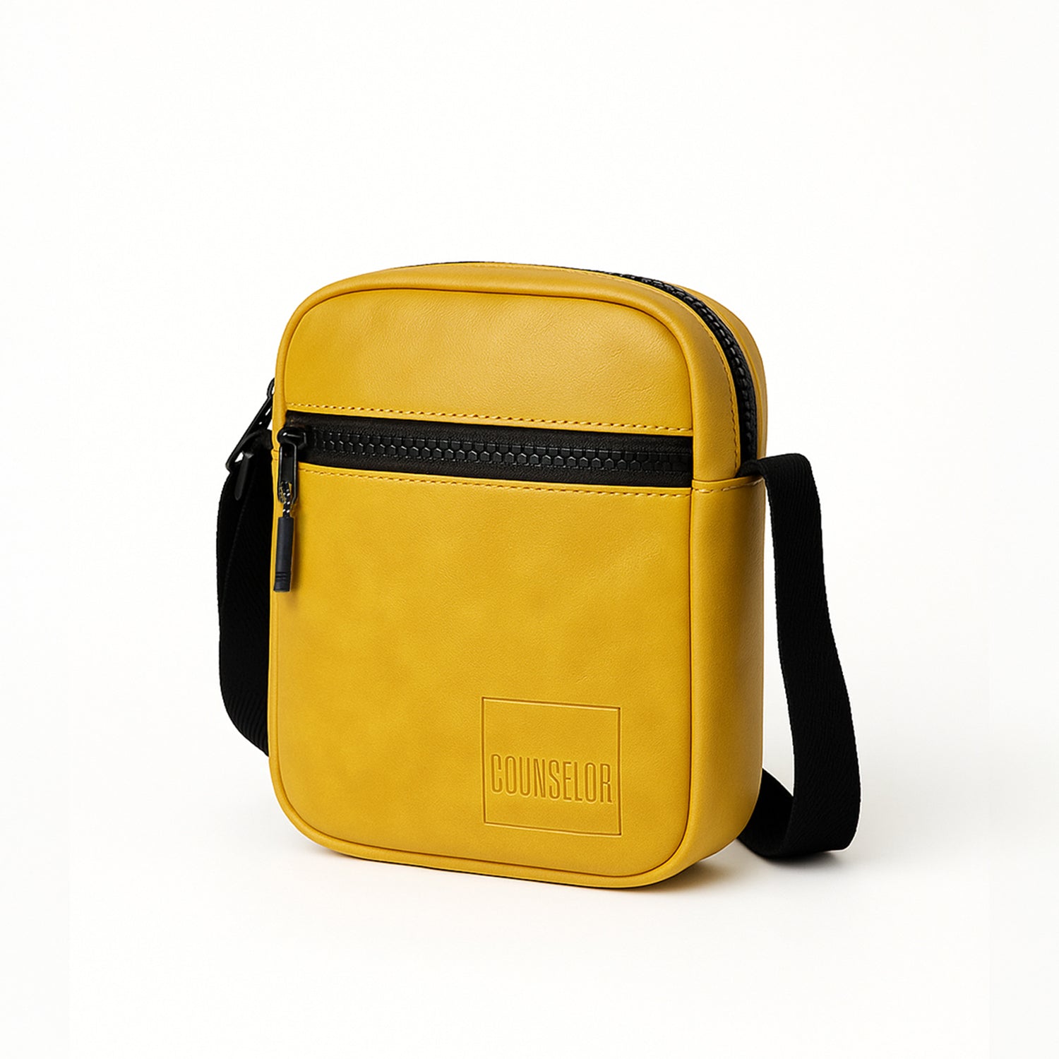 Stylish mustard yellow vegan leather sling bag with adjustable strap and front zipper pocket