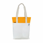The Skylin off-white and yellow canvas tote bag with dual handles, stylish design, and practical compartments.