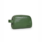 The Swift Toiletry Kit in green, stylish vegan leather with a compact design for travel and daily use.
