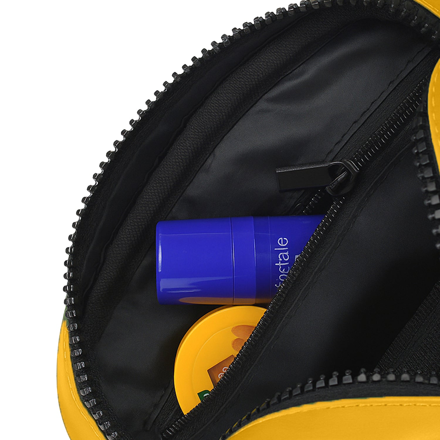 Interior view of the Swift Mustard Toiletry Kit showing organized toiletries and spacious pockets.