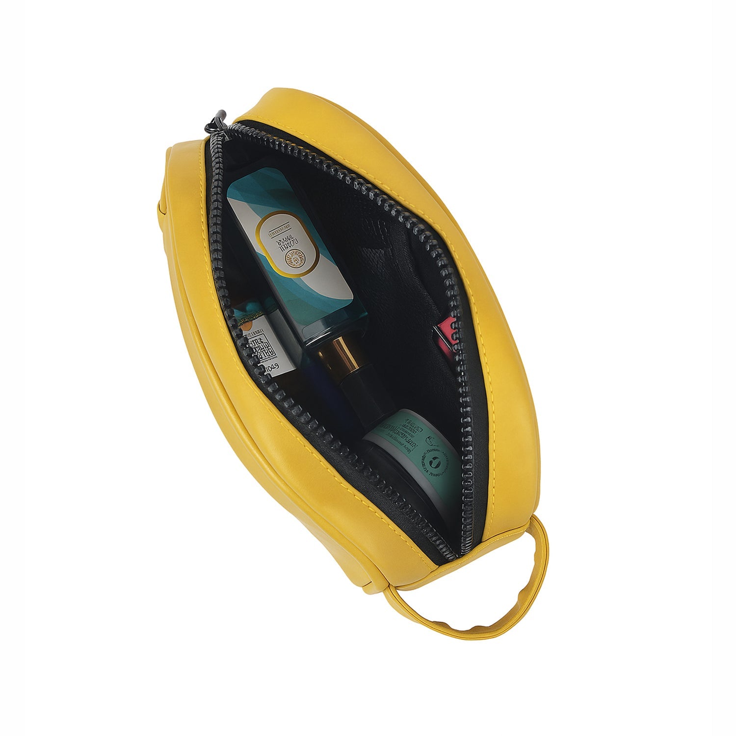 Open view of The Swift Mustard toiletry kit showcasing organized travel essentials inside.