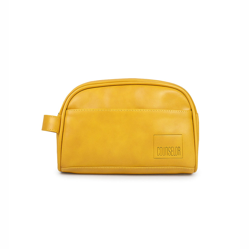 Chic mustard toiletry kit made of vegan leather with spacious pockets for organized travel essentials.