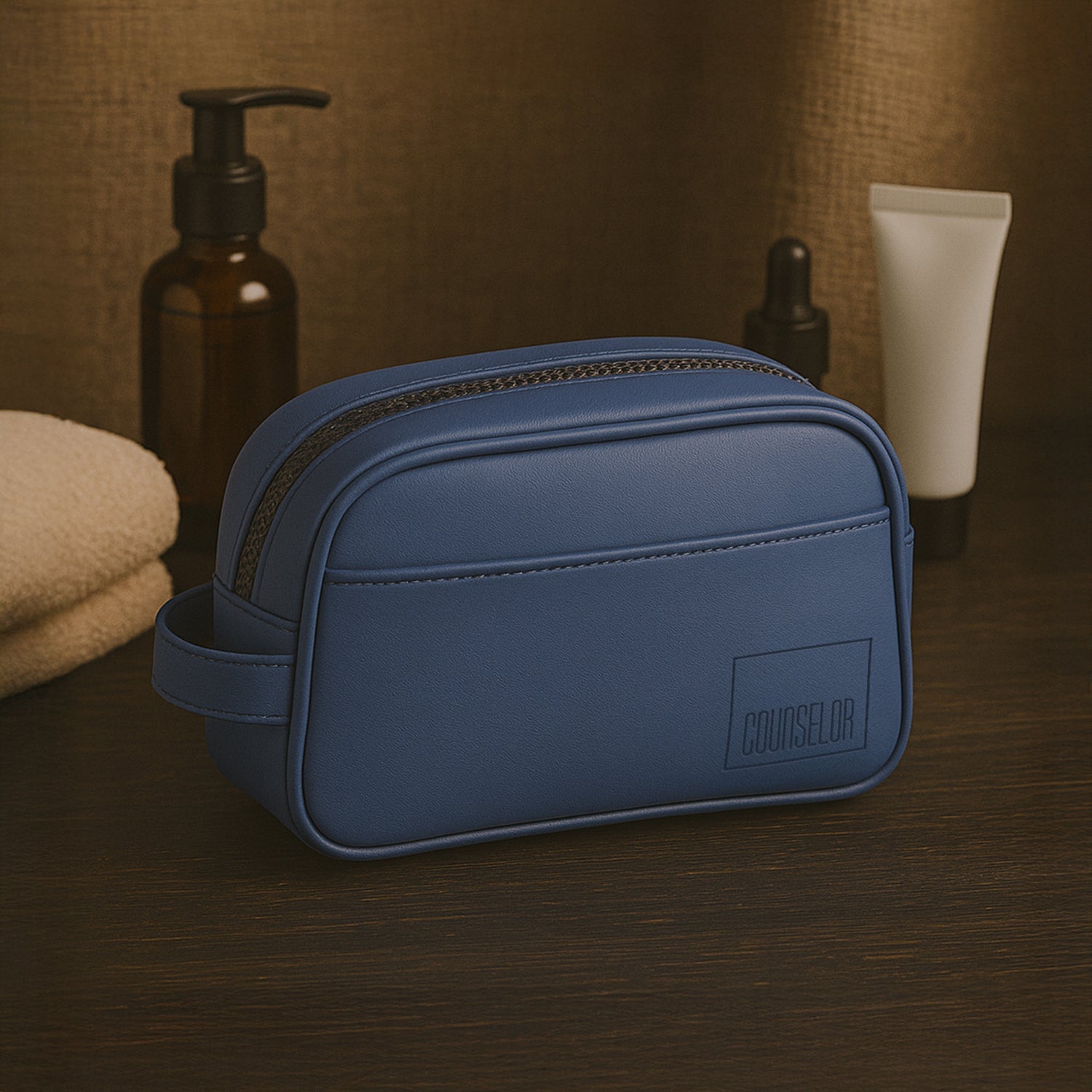Chic navy toiletry kit made from vegan leather, featuring a zippered closure and durable design, ideal for travel and daily use.