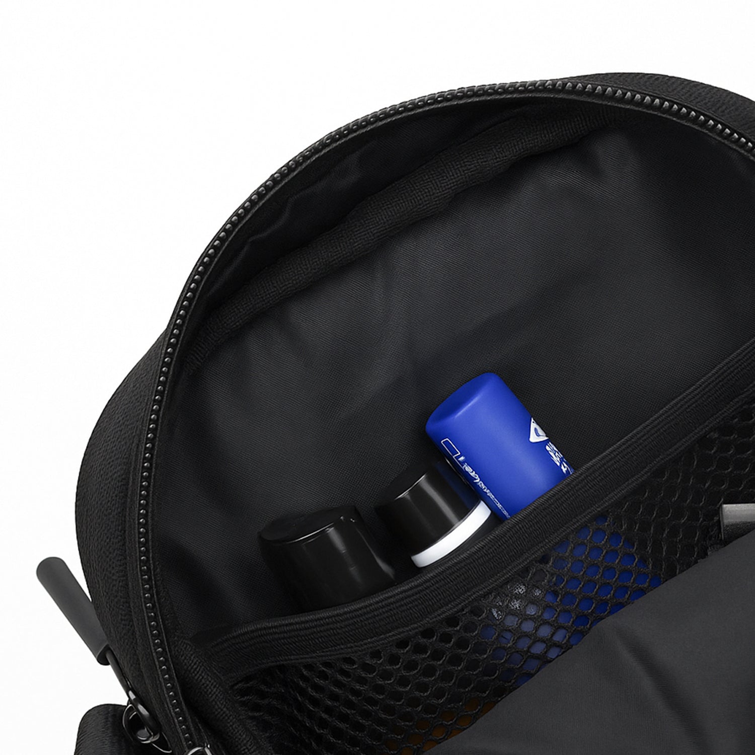 Interior of The Luno bag showing organized essentials in mesh pockets, highlighting functional design and smart storage.
