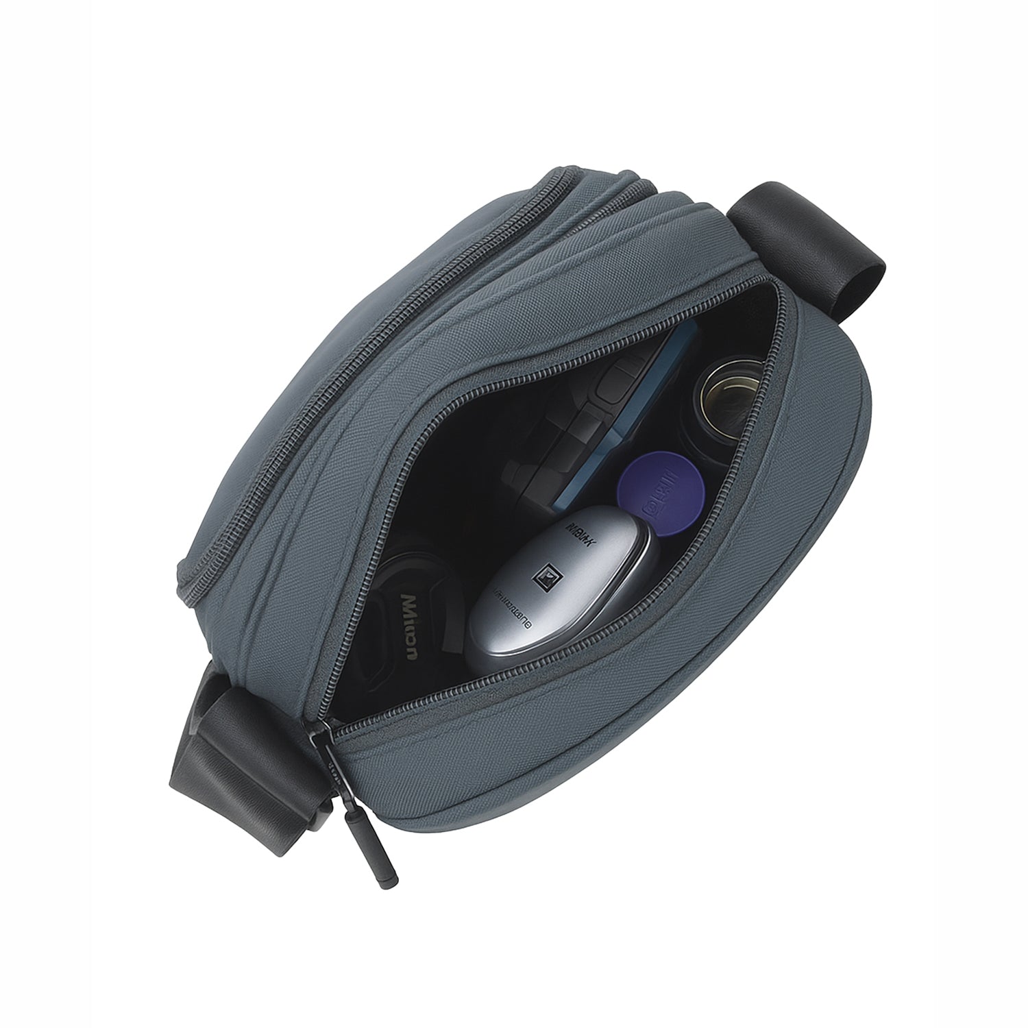 Open grey Luno Sling bag showing organized interior with essentials like a phone, wallet, and other items.