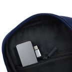 Interior view of the Luno Navy Sling bag showing organized pockets for essentials like a phone and wallet.
