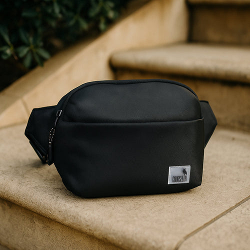 The Avelin black waistpack on stairs, showcasing its minimalist design and versatile storage options for daily essentials.