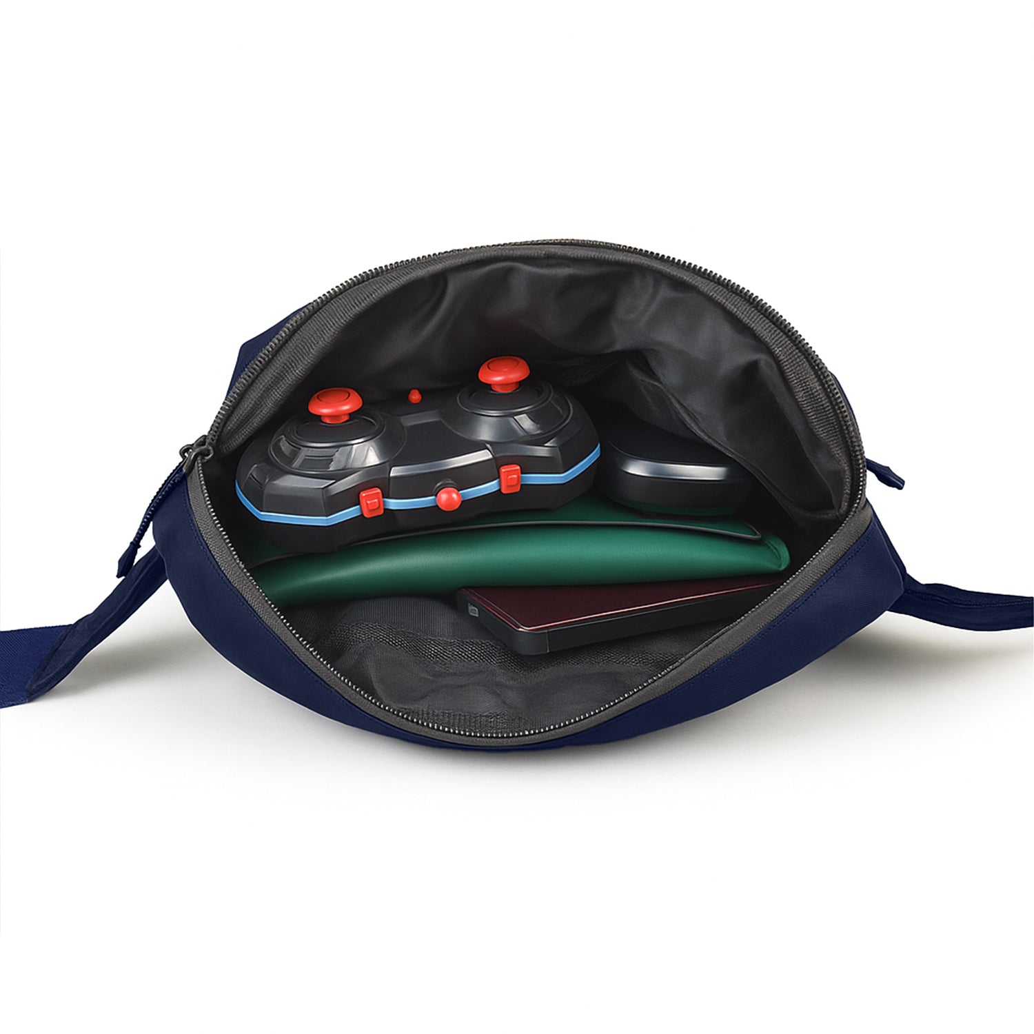Open navy bag showing compact storage for essentials like a gaming controller, notebook, and tablet.