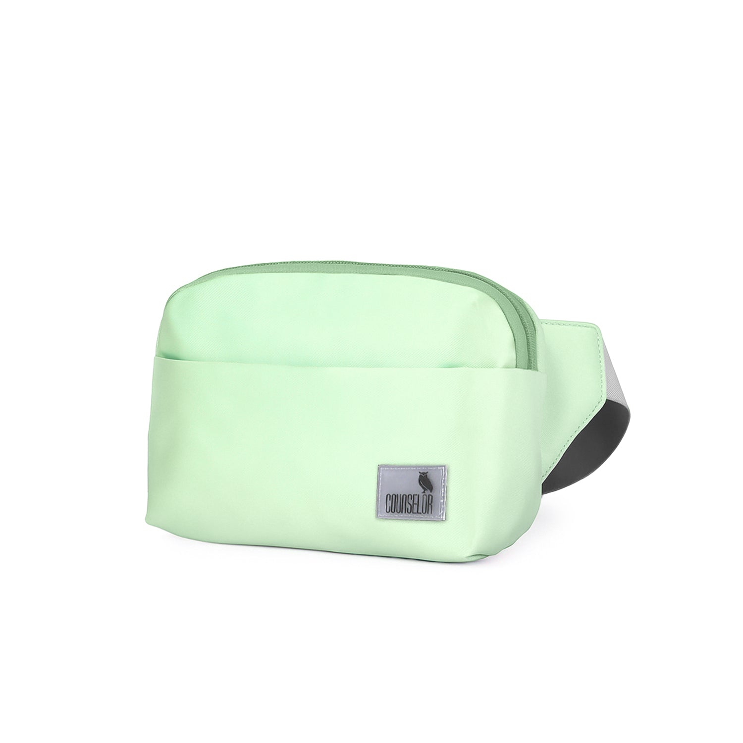 The Avelin waistpack in pista green, lightweight and compact, perfect for everyday use and travel.