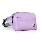 The Avelin waistpack in pink, featuring a compact design with adjustable strap and zippered pockets for essentials.
