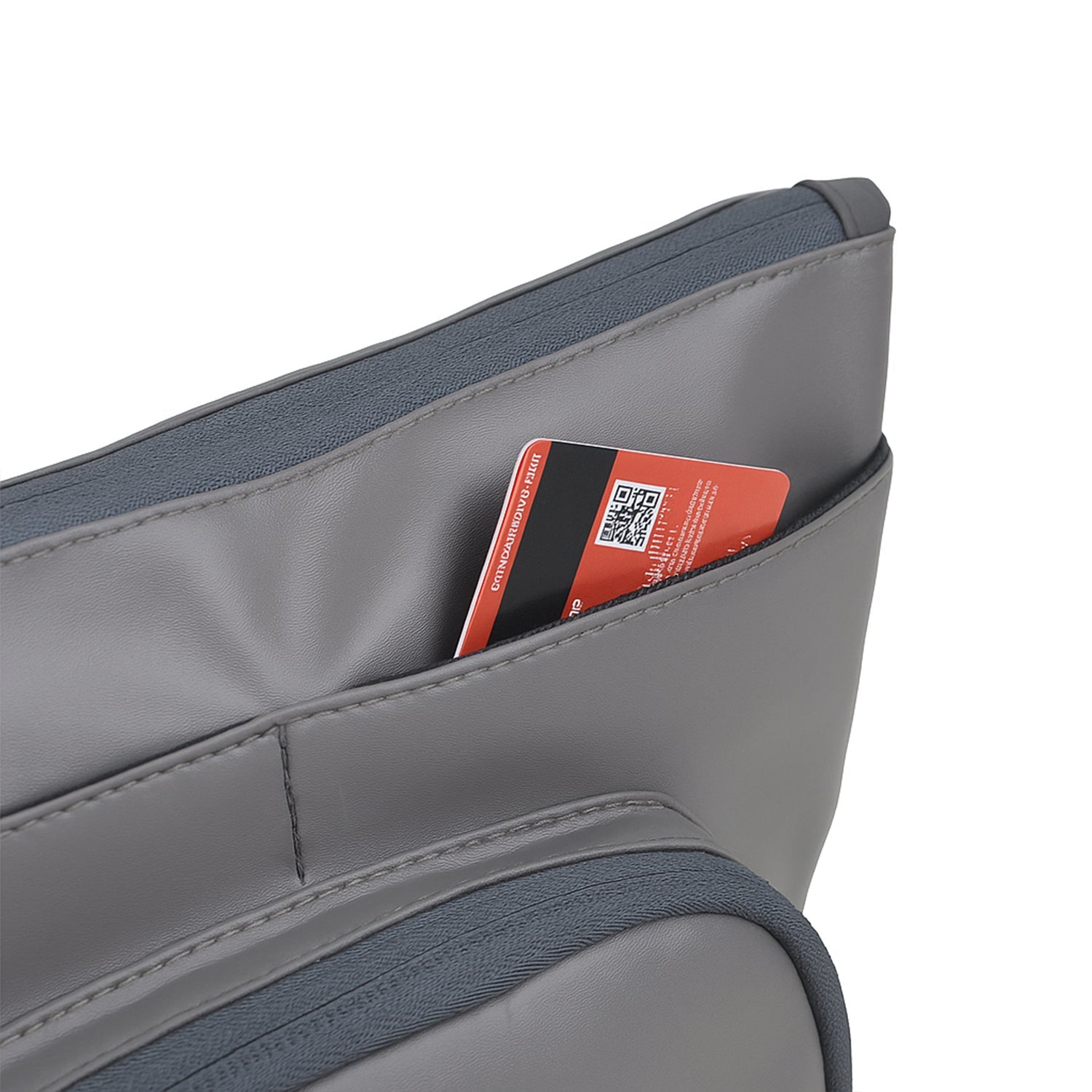 Close-up of The Eiko grey pouch showing an internal slip pocket holding a card, showcasing its compact storage.