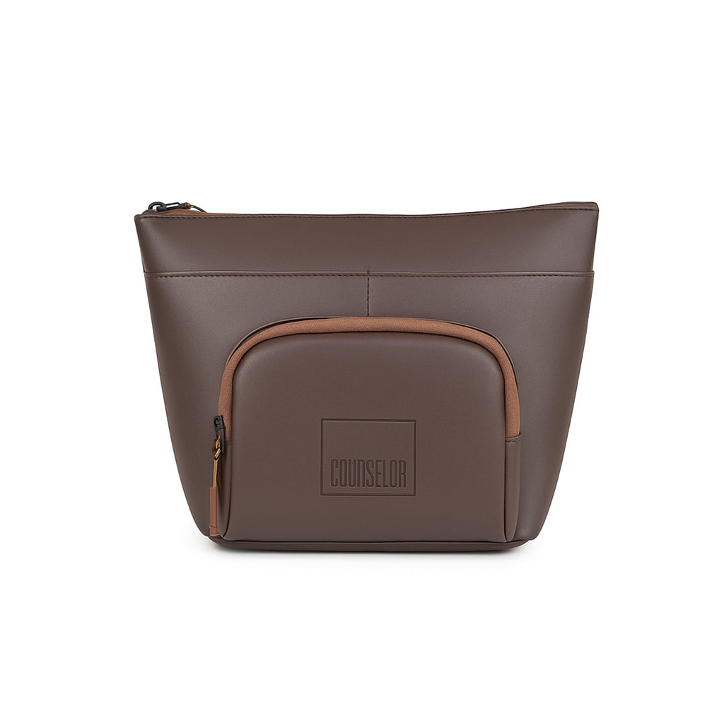 The Eiko brown pouch featuring minimalist design, compact storage, and premium materials.