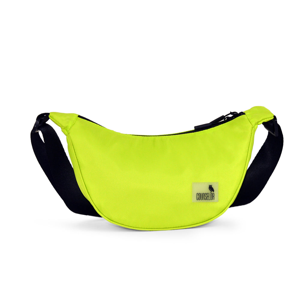 The Zuki lime green side sling bag, slim design, perfect for daily movement and stylish urban commuting.