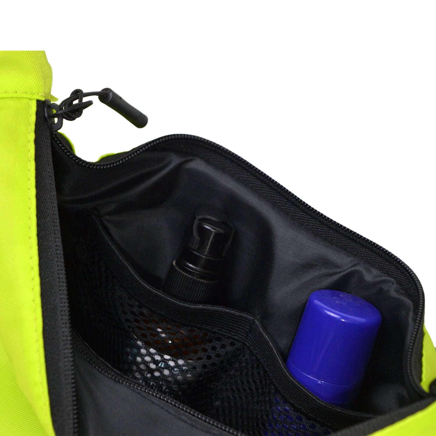 Interior view of The Zuki lime green bag showcasing smart storage for essentials like bottles and more.