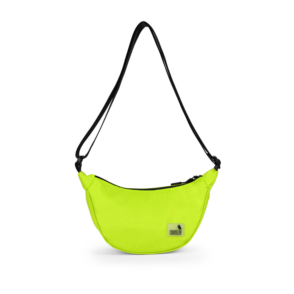 Lime green Zuki side sling bag with adjustable strap, perfect for daily movement and stylish outings.