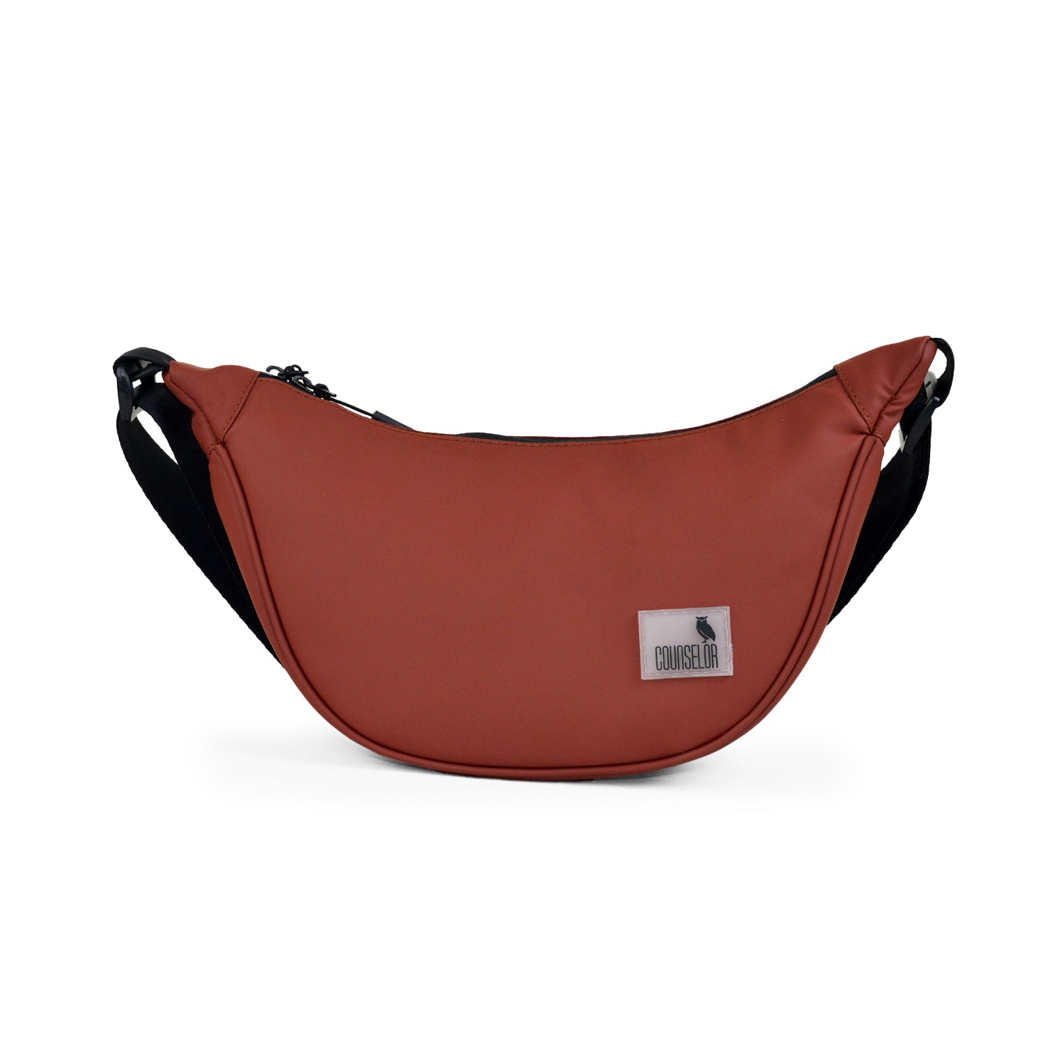 The Zuki side sling bag in rust color, sleek design for everyday use, showcasing compact storage and adjustable strap.