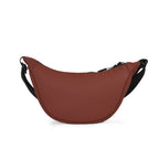 The Zuki Rust side sling bag, sleek design with adjustable strap for style and functionality.