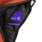 Interior view of The Zuki bag showcasing smart storage with a card pocket and smooth zipper for easy access.