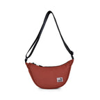 The Zuki - Rust stylish sling bag with adjustable strap and zipper, perfect for daily movement and travel.