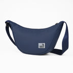 The Zuki navy side sling bag, sleek and compact, designed for daily movement and stylish utility.