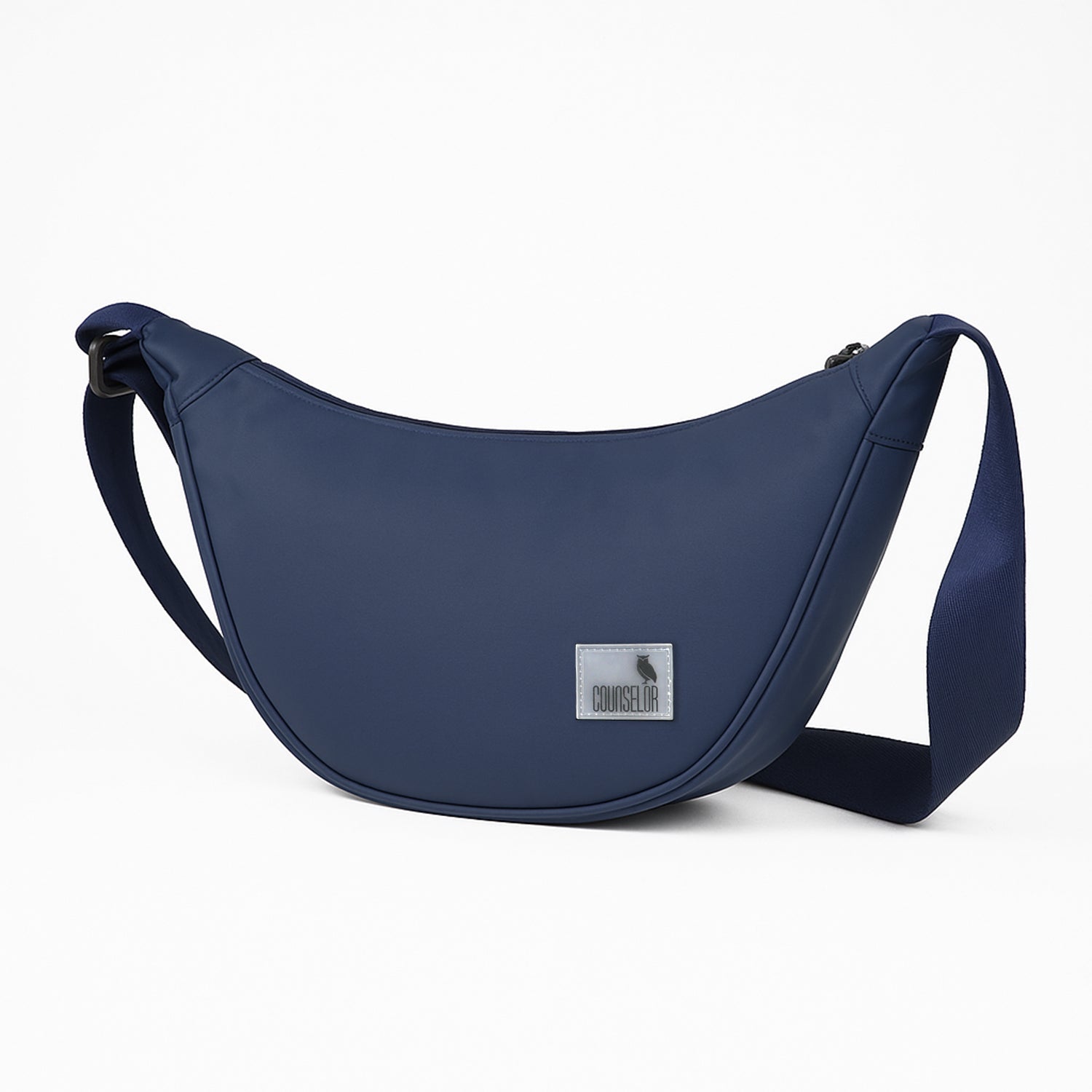 The Zuki navy side sling bag, sleek and compact, designed for daily movement and stylish utility.