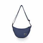 The Zuki navy side sling bag, sleek design, ideal for daily use and travel, featuring an adjustable strap.