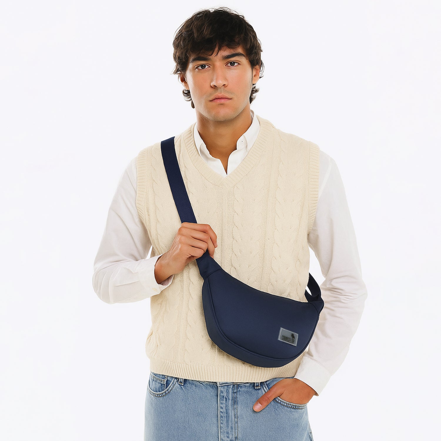 Model wearing The Zuki navy side sling bag, showcasing its sleek design and modern style.