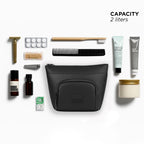 The Eiko black pouch with toiletries and essentials, showcasing minimalist design and compact storage.