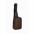 Stylish brown crossbody bag made from vegan leather with an adjustable strap and secure zippers.