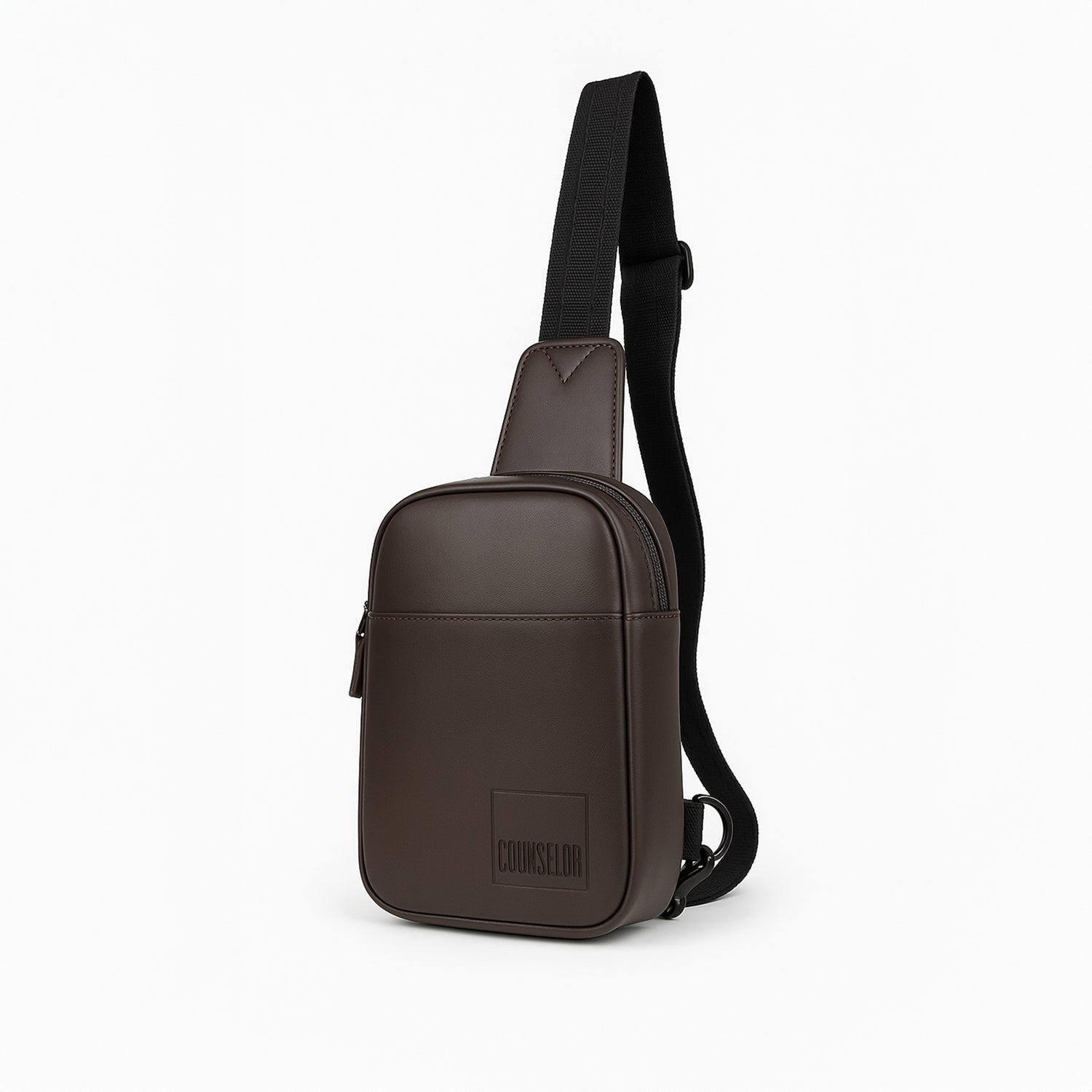 Brown Kiro Crossbody Bag in eco-friendly vegan leather, featuring adjustable strap and secure zipper pockets.