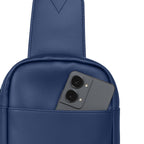 Navy crossbody bag with smartphone in front pocket for stylish and efficient organization.