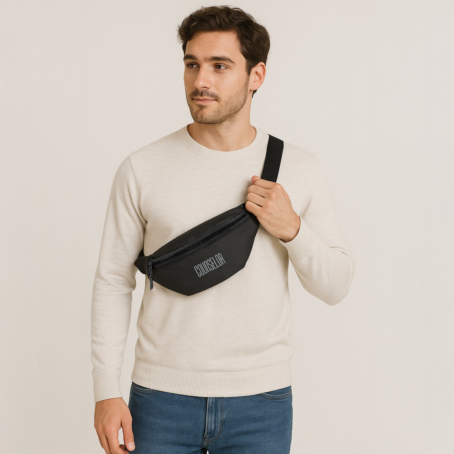 Man wearing the Nexo Black waist pouch, showcasing its stylish yet practical design for everyday use.