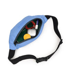 Sky blue waist pouch open, showcasing organized interior with essentials like earbuds, lip balm, and notebook.