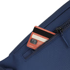 Close-up of navy waist pouch showing a card in the zip pocket, highlighting compact storage and durable design.