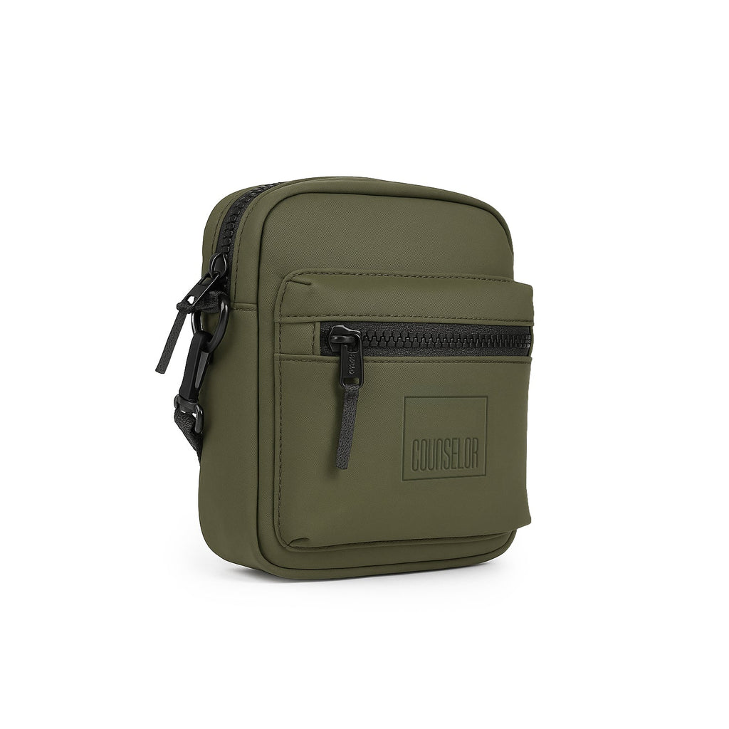 Stylish olive green bag with heavy-duty zippers, featuring a front pocket and a sleek design for everyday use.