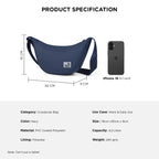 Navy crossbody bag specifications with size, material details, and iPhone 16 for scale.